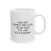And Yet Despite the Look on My Face Mug