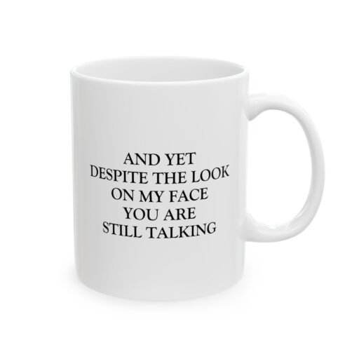And Yet Despite the Look on My Face Mug